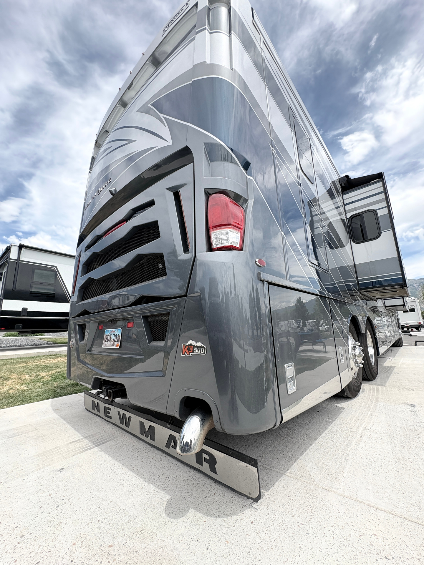 Rear angle of Class A motorhome before detailing service
