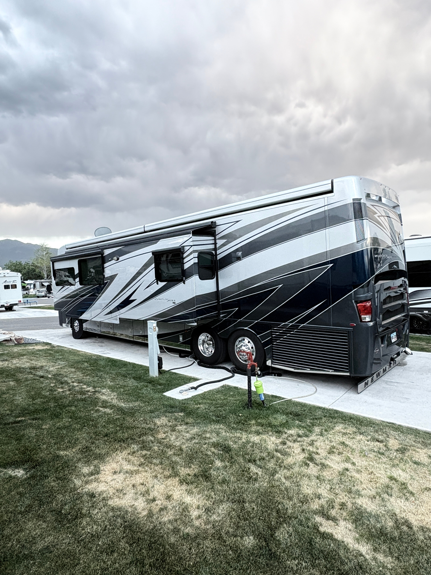 Class A motorhome passenger side after full exterior detail
